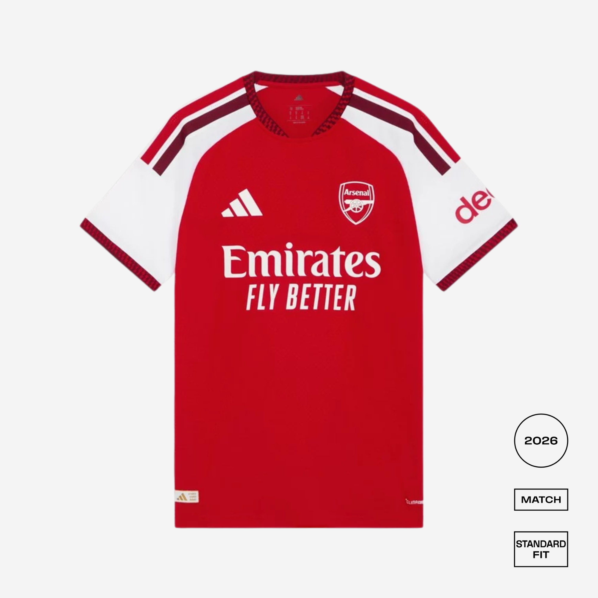 Red sports jersey with Emirates logo on a white background