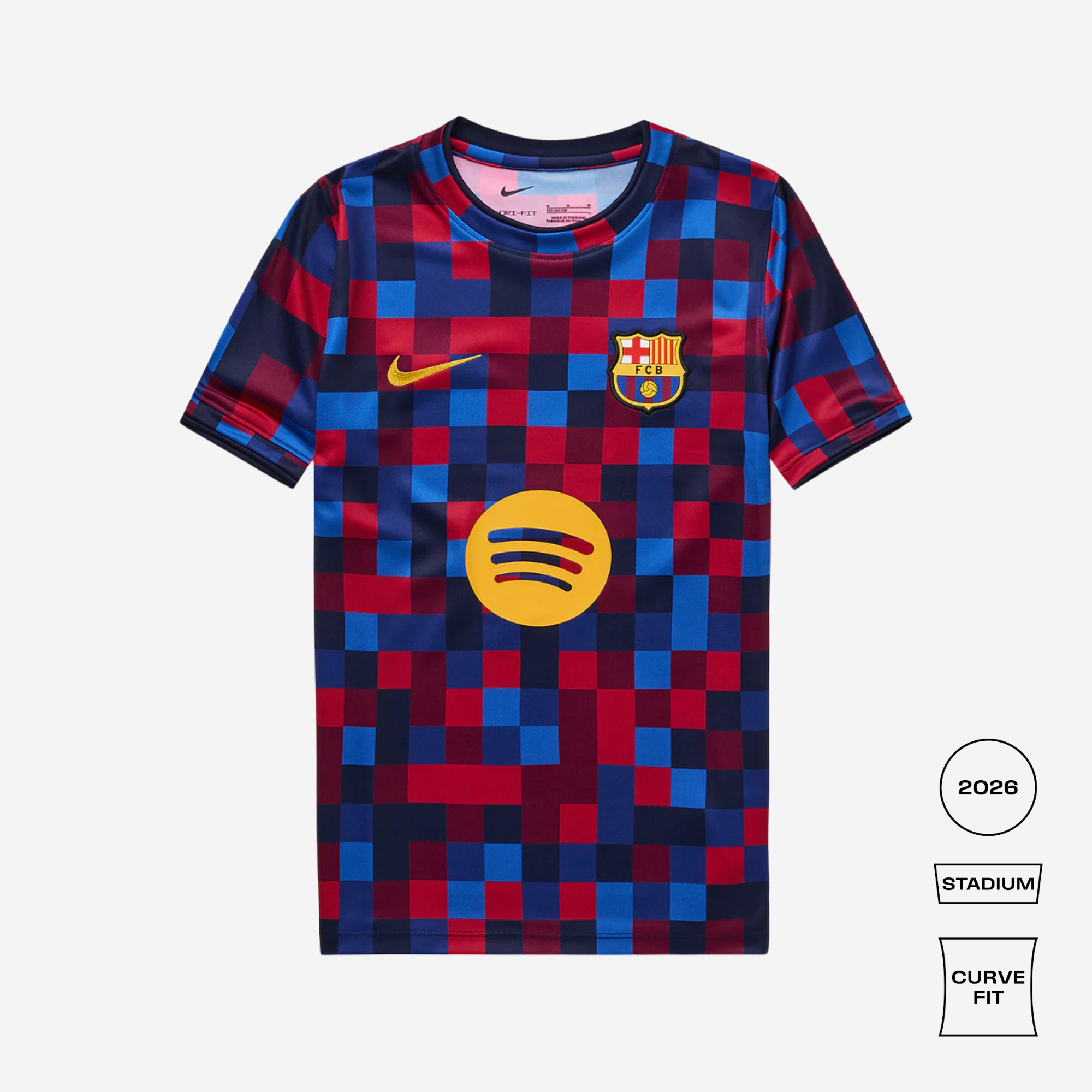 A Nike FC Barcelona home jersey in a 2028 Stadium Curve Fit design, featuring a red and blue checkered pattern, a yellow Spotify sponsor logo, and a yellow Nike swoosh on a light gray background.