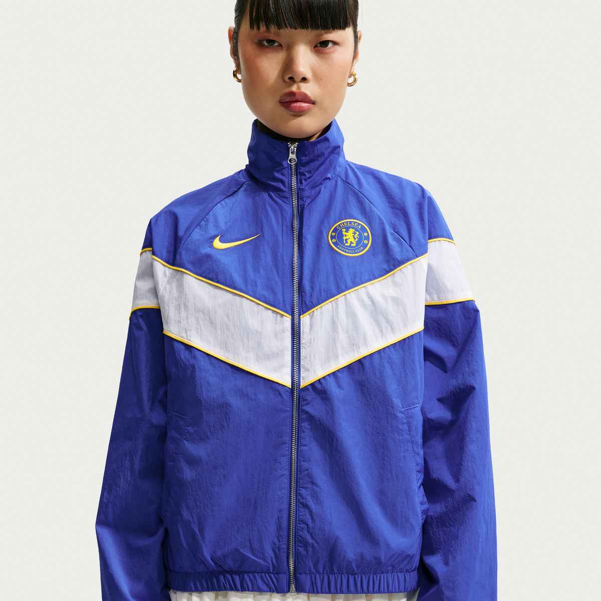 windbreaker on women blue and yellow